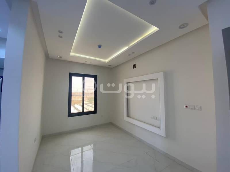 Apartment with a roof for sale in the Al Rimal, East of Riyadh