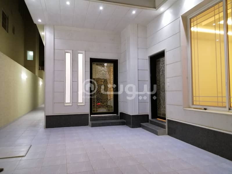 Villa with internal stairs and two apartments for sale in Al Munsiyah district, east of Riyadh