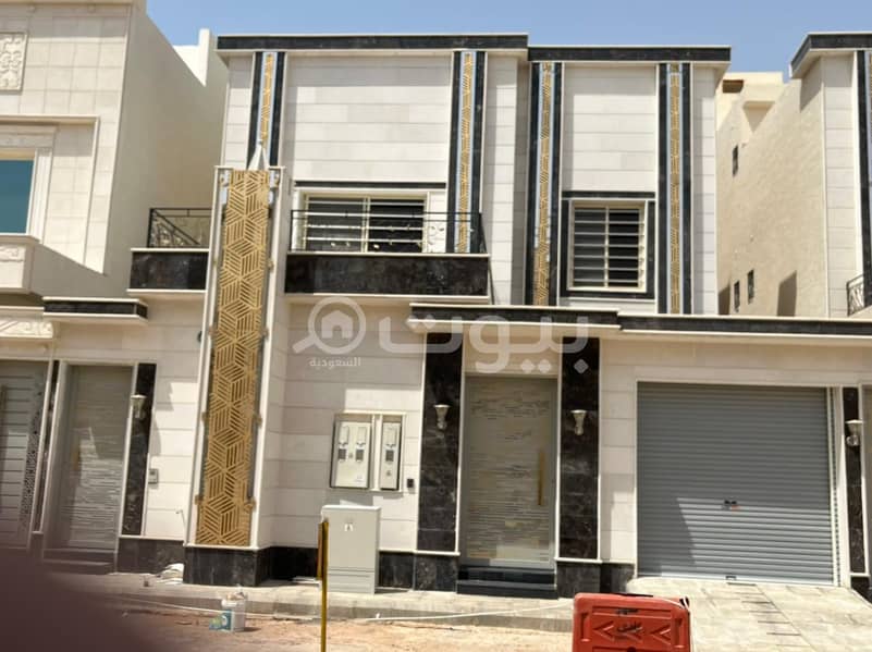 A staircase villa and two apartments for sale in Al Nahdah, East Riyadh