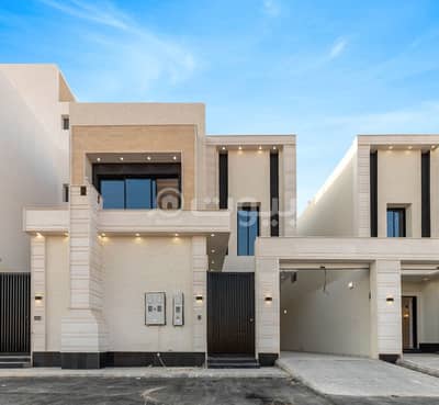 5 Bedroom Villa for Sale in Riyadh, Riyadh Region - Villa with internal stairs and two apartments for sale in Rimal, East Riyadh