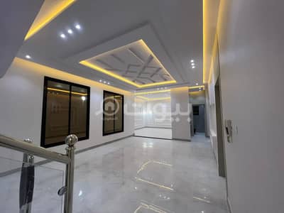 5 Bedroom Villa for Sale in Riyadh, Riyadh Region - Villa with staircase and two apartments for sale in Al Rimal, East of Riyadh