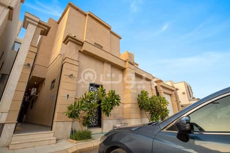 13 Bedroom Villa for Sale in Riyadh, Riyadh Region - Villa with staircase and 3 apartments for sale in Al Arid District, North of Riyadh