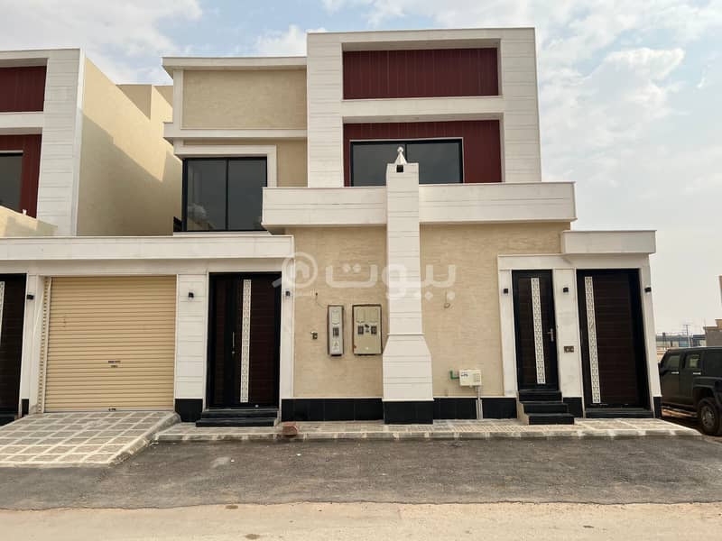 For sale a hall staircase with two apartments in Al Rimal, east of Riyadh