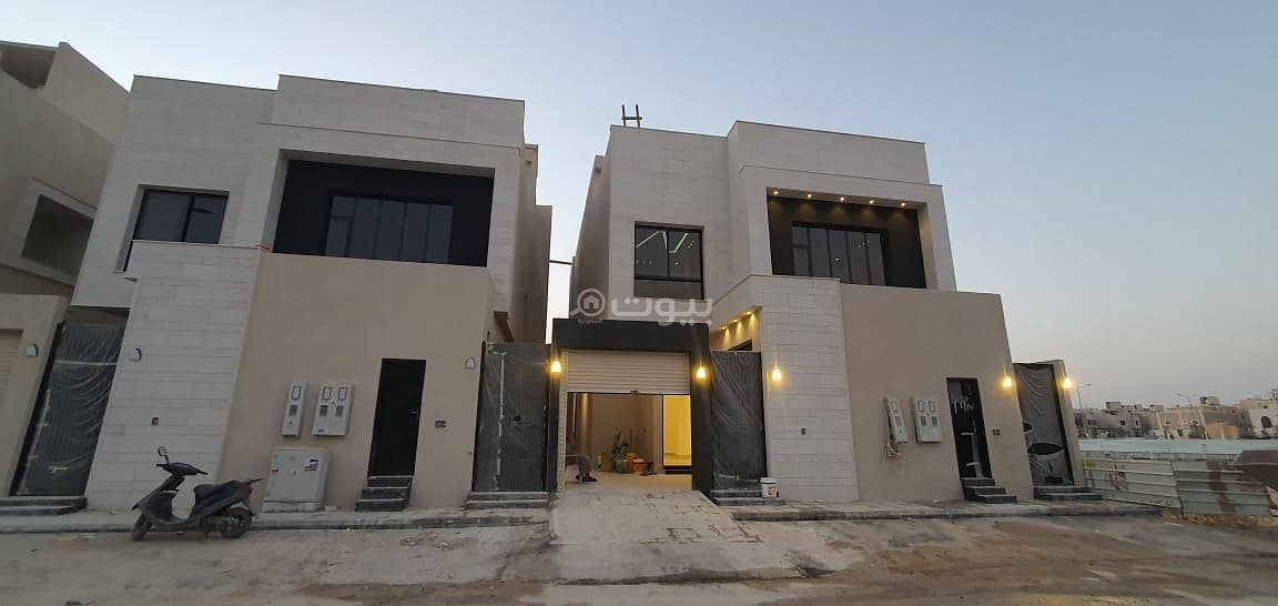 An internal staircase villa with two apartments for sale in Al Narjis, North Riyadh