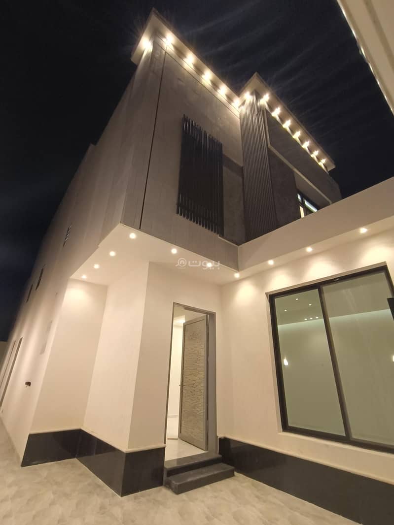 An internal staircase villa and two apartments for sale in Al Bayan Neighborhood, East Riyadh