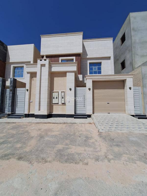 Villa for sale with two separate apartments, luxury finishing in Al Biyan neighborhood