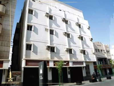 Commercial Building for Sale in Madina, Al Madinah Region - 56 Rooms Building For Sale on Dura Bin Hashim Bin Atbah Street, Al Madinah Al Munawwarah