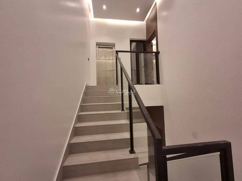 Apartment with roof in Al-Qadisiyah neighborhood at a special price