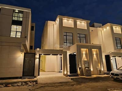 5 Bedroom Villa for Sale in East Riyadh, Riyadh - Modern villa with stairs and an apartment in Al Muayzilah district