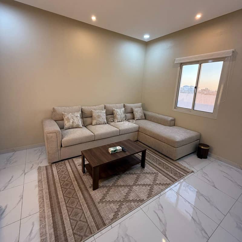 A bedroom and a lounge