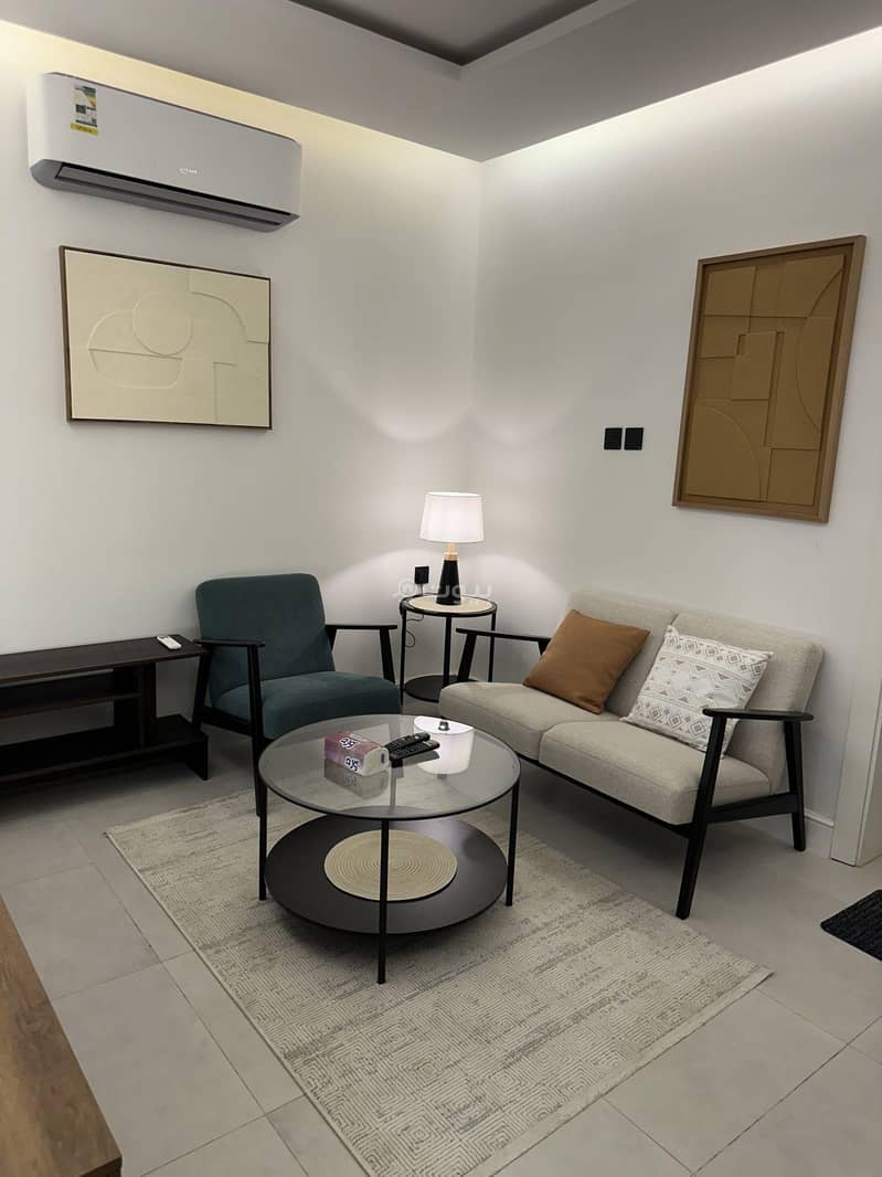 A room and a hall with outdoor seating