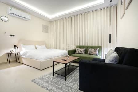 1 Bedroom Apartment for Rent in Riyadh - Studio with master bed and side seating