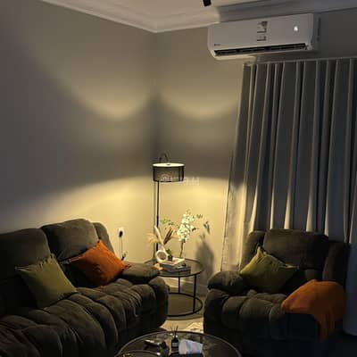 1 Bedroom Apartment for Rent in Riyadh - A apartment in a bedroom and a lounge with smart entry