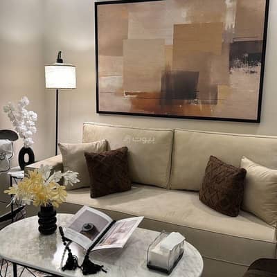 1 Bedroom Flat for Rent in Riyadh - Apartment consisting of a bedroom and a lounge