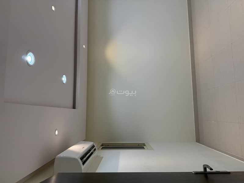 For rent: an apartment in Al-Nada neighborhood with air conditioning and a fitted kitchen.