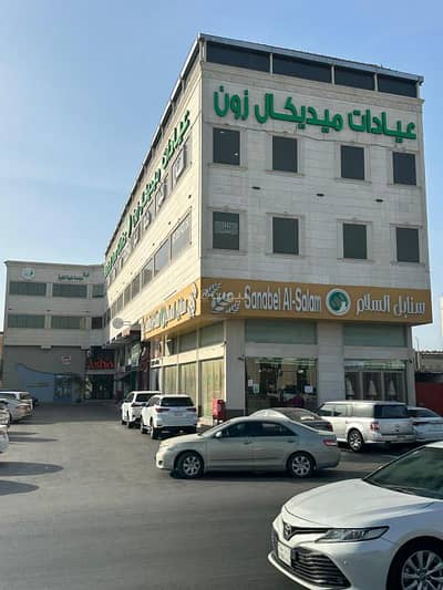 Building for Sale in Al Rakah Al Shamaliyah, Dammam - Commercial building for sale on Khalid bin Al-Walid Street in Al-Rakah, excellent location, good income.
