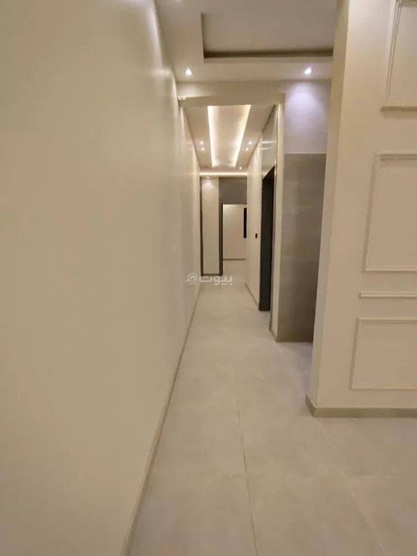The first floor of Al-Jenadriyah, Al-Ghusoon plan, T elevator for passengers, two entrances, men's majlis with sinks and a bathroom, spacious hall, kitchen, 4 bedrooms, including one master with a bathroom serving the rest of the rooms, area of 199.