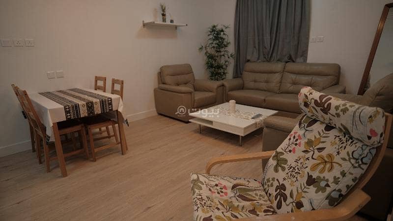 Two bedrooms with an IKEA-designed living room and a large kitchen