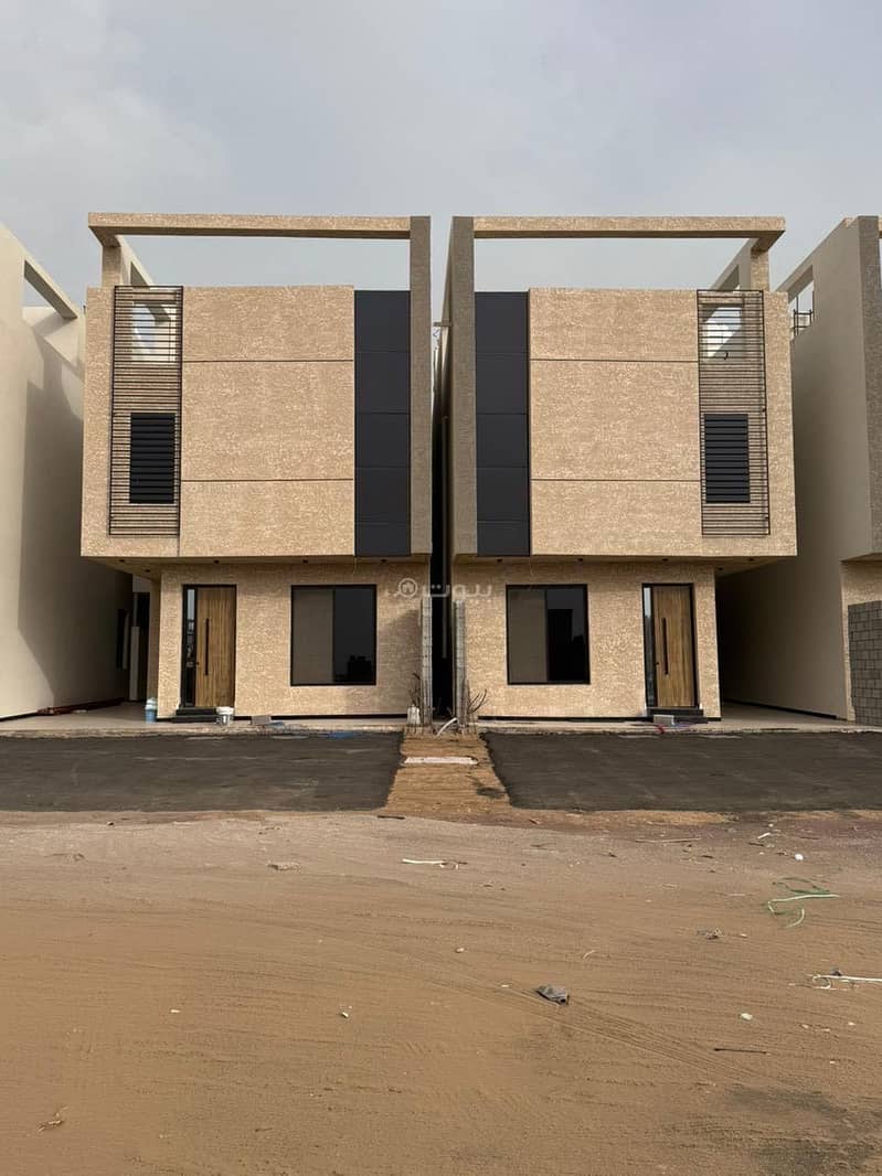 A two-story villa with a separate duplex annex in the Al-Rehab neighborhood, featuring luxurious finishes.