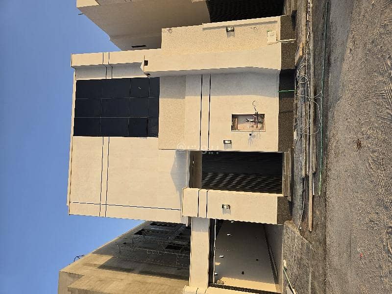 For sale in Al Rimal neighborhood, a villa with internal stairs and an apartment facing north on a 18m street.