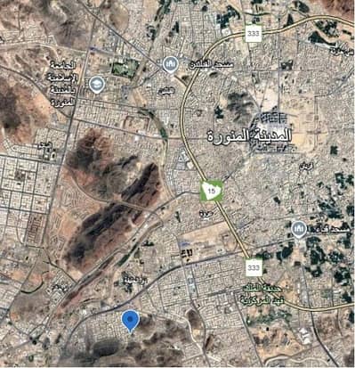 Residential Land for Sale in Abu Burayqa, Madina - Land within the sanctuary limits on three streets.