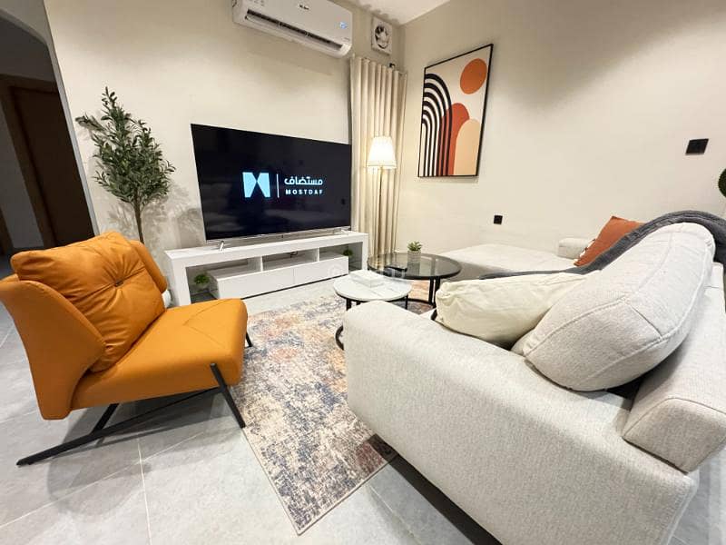 Two-bedroom apartment with a stylish 70-inch TV, prime location | Unit for rent fully in Jeddah, Saudi Arabia