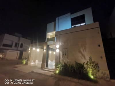 5 Bedroom Villa for Sale in East Riyadh, Riyadh - A villa with an internal staircase and an apartment for sale in the Al-Monsiyah neighborhood.