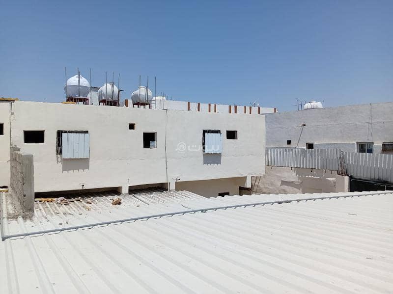 For sale, a building in the Al-Asfairin neighborhood in Medina.