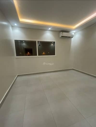 2 Bedroom Flat for Rent in East Riyadh, Riyadh - Apartment with two bedrooms, a living room, a kitchen, and a bathroom on Al-Sahaba Street for annual rent.