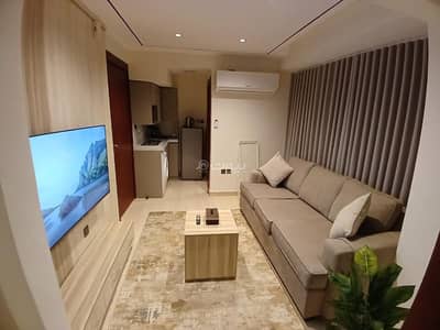 1 Bedroom Apartment for Rent in East Riyadh, Riyadh - Luxury apartment consisting of a bedroom and a living room