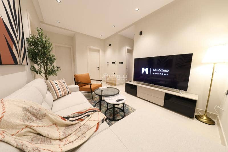 Elegant and luxurious two-bedroom apartment with a 70-inch television | Stylish design | Fully furnished unit for rent in Jeddah, Saudi Arabia
