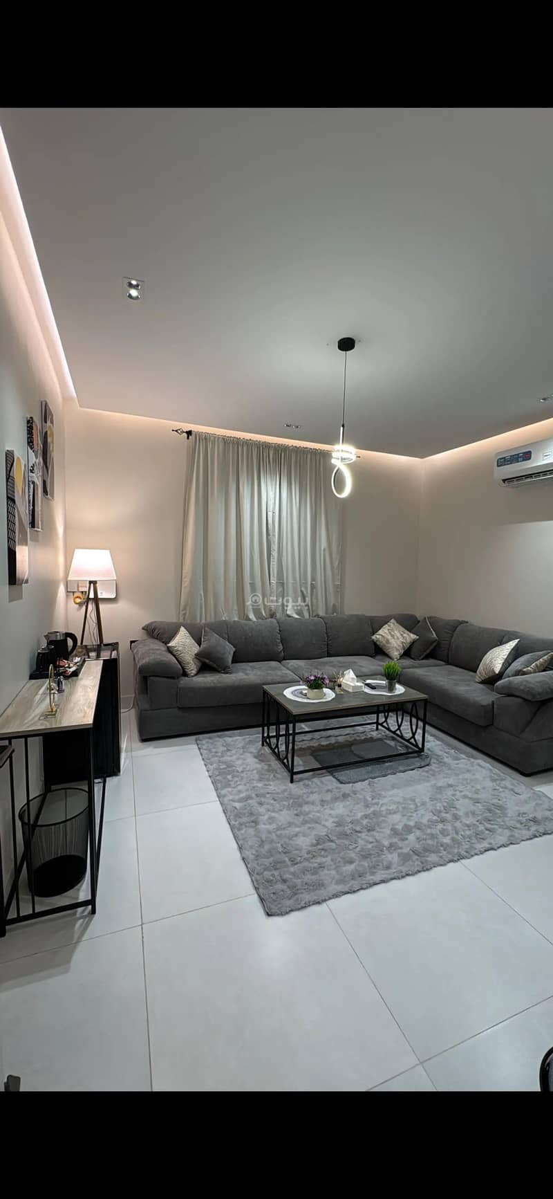 An apartment consisting of one bedroom and a living room An apartment consisting of one bedroom and a living room