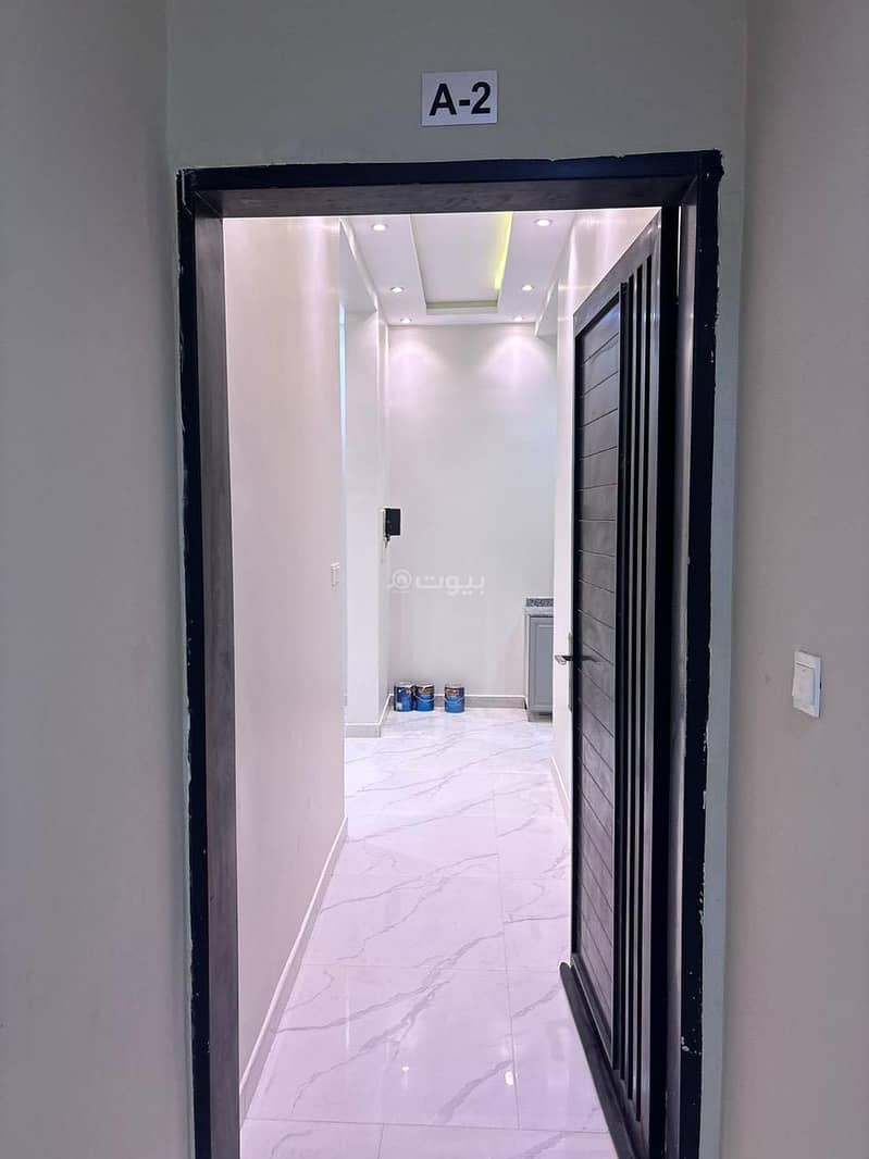 A spacious one-bedroom apartment with a hall, kitchen, and bathroom. A spacious one-bedroom apartment with a hall, kitchen, and bathroom.