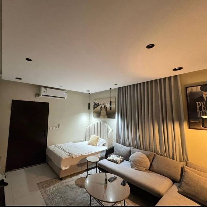 An elegant studio with a private entrance and privacy