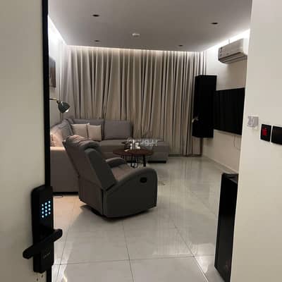 1 Bedroom Apartment for Rent in Riyadh - Apartment with living room and bedroom