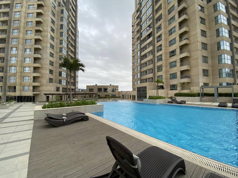 شقة فاخرة بغرفتين نوم مع إطلالة على المسبح للبيع بمشروع اعمار باب جدة حي الفيحاء