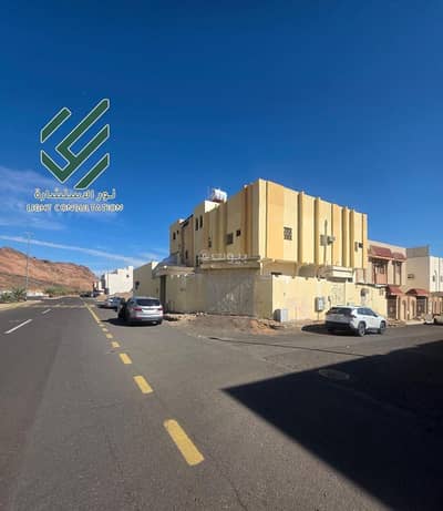 11 Bedroom Residential Building for Sale in Al Salam, Madina - Opportunity to sell a residential-commercial building in Medina, Al-Difa neighborhood.