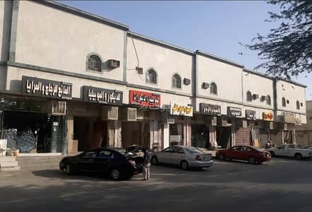 Residential Building for Sale in East Riyadh, Riyadh - An investment opportunity for sale of a commercial residential building in the Rawdah neighborhood, consisting of 14 apartments and 14 shops with an a