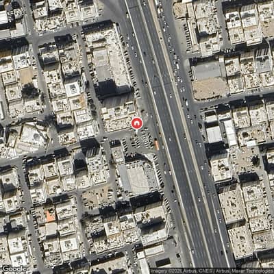 Commercial Building for Sale in North Jeddah, Jeddah - Commercial building for sale on a bustling street in Jeddah