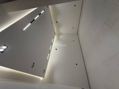 5 Bedroom Villa for Sale in East Riyadh, Riyadh - For sale: a modern villa with an interior staircase and an elevator - Al-Bayan neighborhood