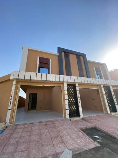 5 Bedroom Villa for Sale in South Riyadh, Riyadh - Upper floor with an apartment in the Sama Okaz neighborhood