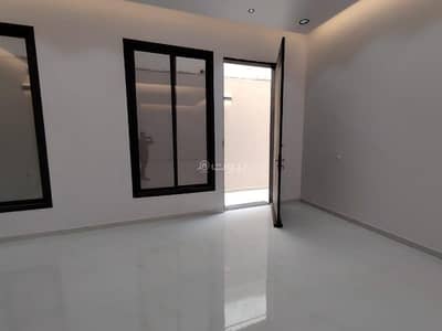 5 Bedroom Villa for Sale in East Riyadh, Riyadh - Villa with internal stairs and an apartment in Al-Janadriyah neighborhood