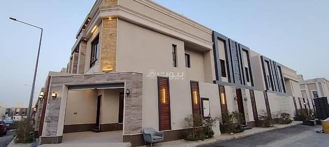 5 Bedroom Villa for Sale in East Riyadh, Riyadh - Corner villa with an interior staircase and an apartment in (Tanqal District) very close to the airport