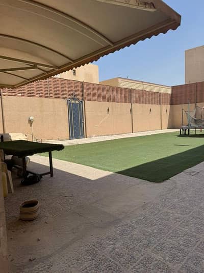 فیلا 9 غرف نوم للبيع في شمال الرياض، الرياض - فيلا للبيع في شارع الحديدة, حي الملقا, مدينة الرياض, منطقة الرياض