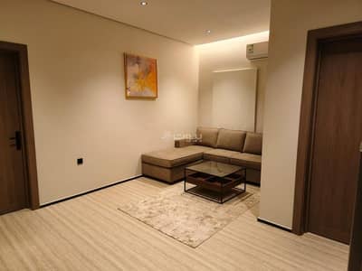1 Bedroom Flat for Rent in East Riyadh, Riyadh - A luxurious apartment in Al-Hamra district consisting of a living room and a bedroom