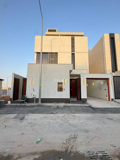 4 Bedroom Villa for Sale in East Riyadh, Riyadh - For sale, a villa with an internal staircase and an apartment in a prime location in the Al Rimals neighborhood, modern design.