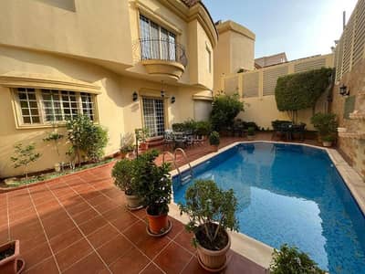 7 Bedroom Villa for Sale in North Jeddah, Jeddah - Elegant villa for sale with a pool and outdoor seating… the address of luxury in Al Hamdiyah