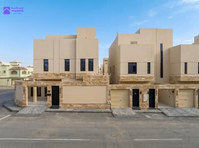 4 Bedroom Villa for Sale in South Riyadh, Riyadh - Modern villa for sale in Badr neighborhood – stone facade and luxurious finish