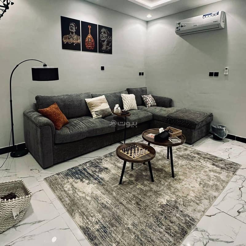 An apartment with a living room and a master bedroom An apartment with a living room and a master bedroom
