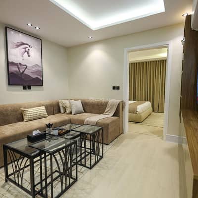 1 Bedroom Apartment for Rent in Riyadh - Apartment consisting of a bedroom and a lounge